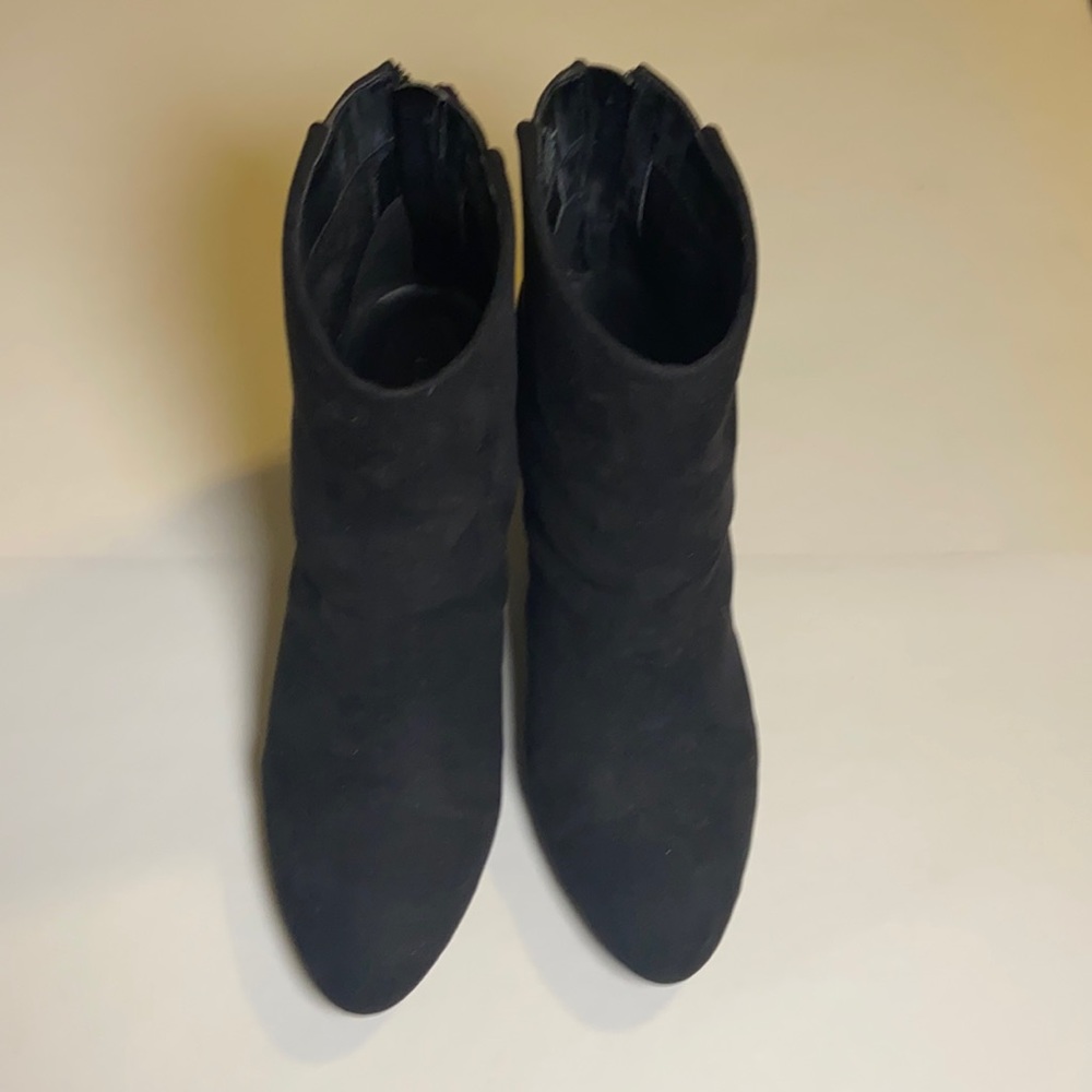 Black booties with tassel zipper